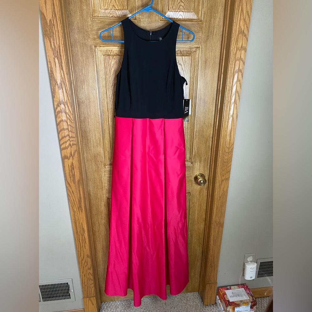 Beautiful full length dress black top has stretch and pink bottom has pockets